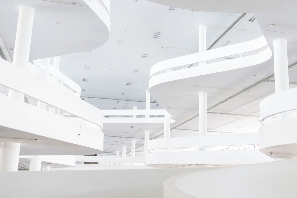 View of Oscar Niemeyer's white-painted Bienal Pavilion in São Paulo.