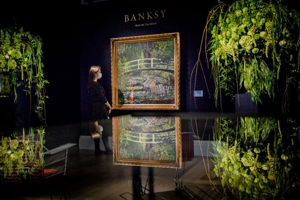 LONDON, ENGLAND - OCTOBER 16:  Banksy’s ‘Show me the Monet’ est.   £3-5 million, goes on view at Sotheby's on October 16, 2020 in London, England. The artwork is one of the highlights of Sotheby's livestreamed Contemporary Art Evening Auction taking place on 21st October 2020. (Photo by Tristan Fewings/Getty Images for Sotheby's)