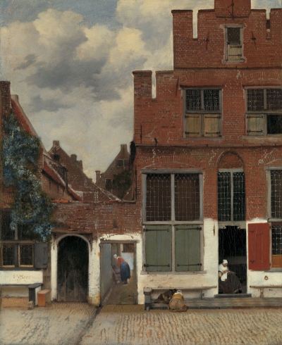 An outdoor scene showing a red-bricked building and an adjacent alleyway. A woman is seated on the building's doorstep, and two children kneel near a bench beside her. In the alleyway, a woman wearing a dress works. Some of the buildings are covered in ivy. A cloudy blue sky hangs overhead.