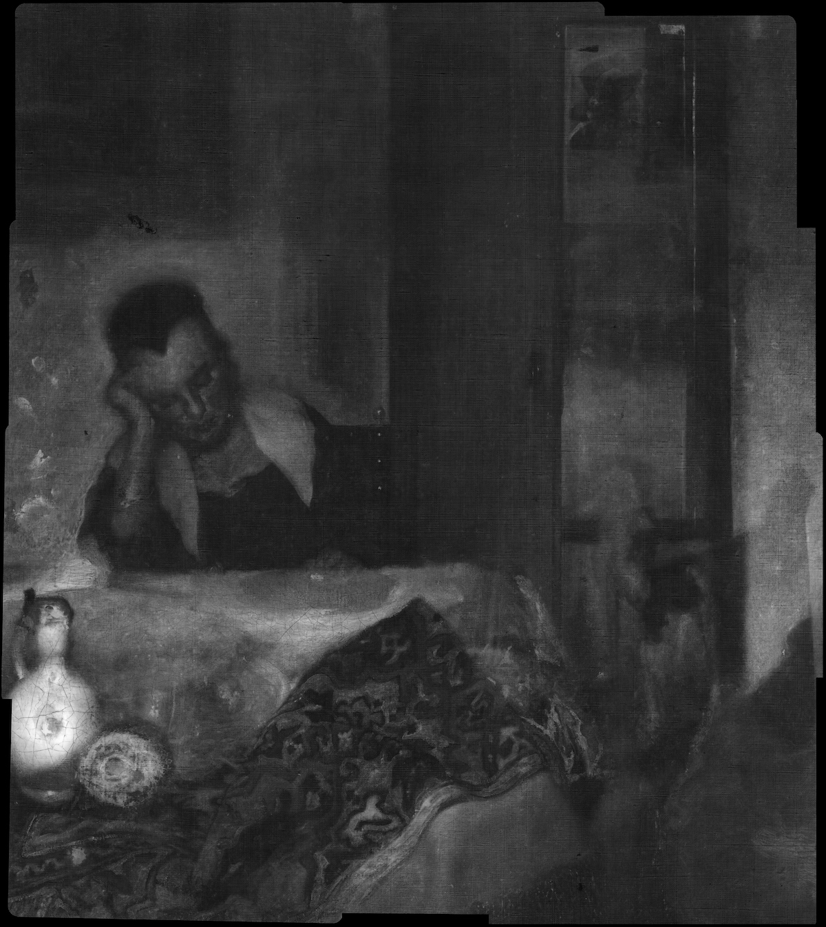 A black-and-white scan of a woman asleep at a table that has a jug and a fabric on it. Nearby, a doorway leads to an adjacent room. In that room, the faint outline of a man can be seen.